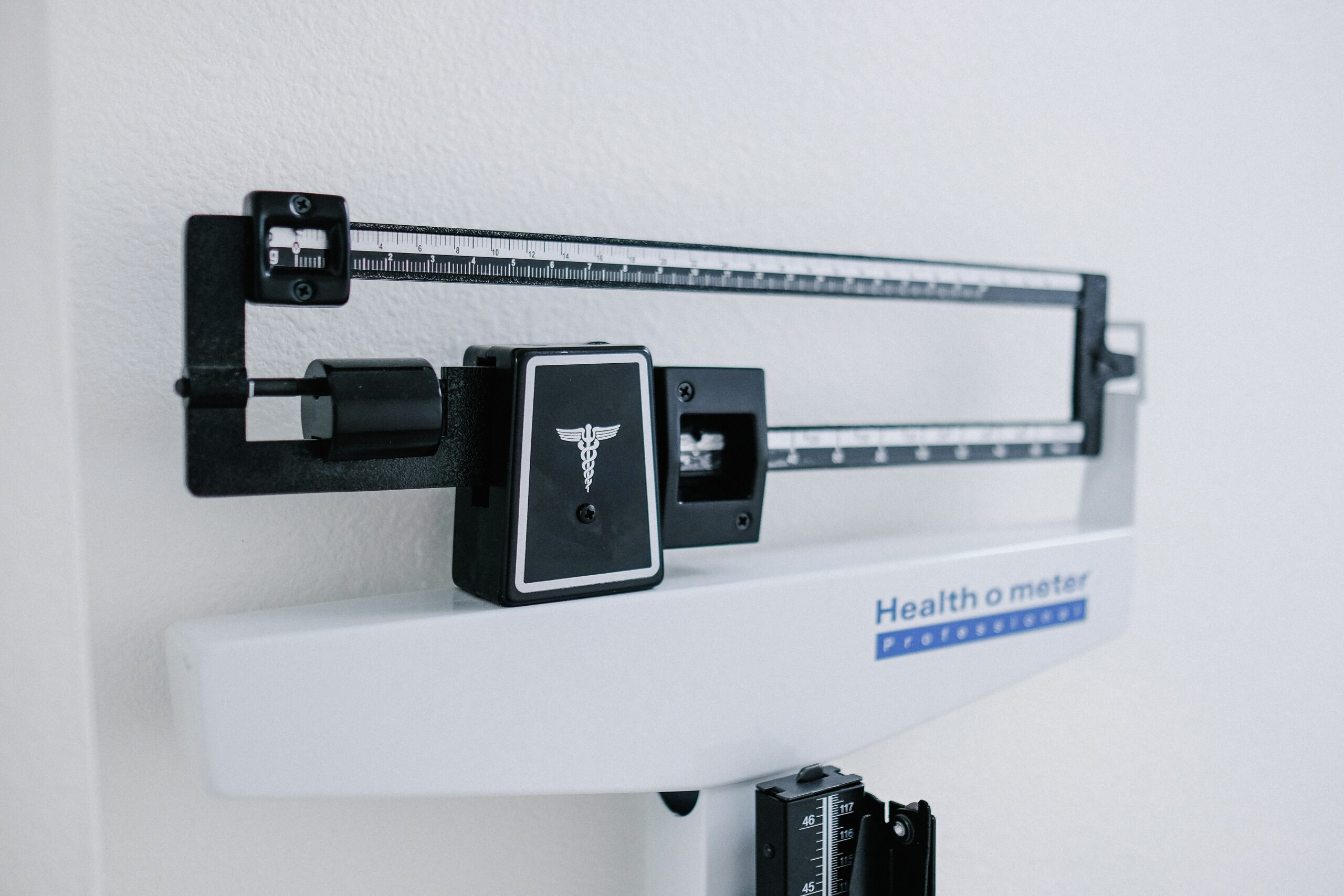 A set of scales representing the battle men face with eating disorders