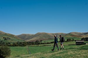 Two men walking - symbolising opening up when traditional therapy doesn't feel right.